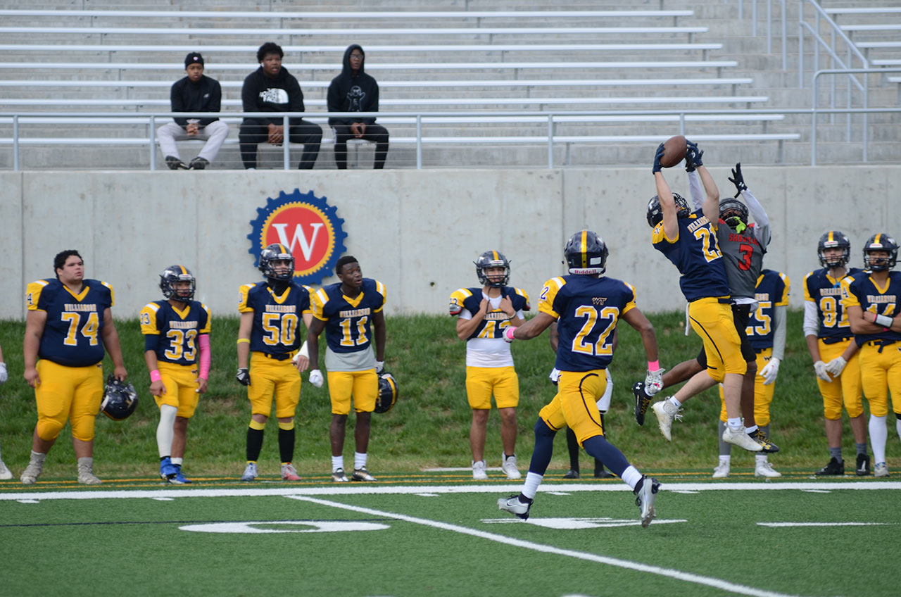 Cooper Conroy (21) and Kelly Battis (22) each intercepted passes in Williamson's loss on Saturday