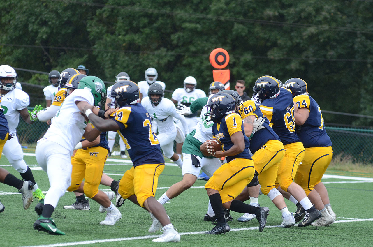 Nazaire Miller on his way to a 36-yard TD run behind great blocking by the offensive line