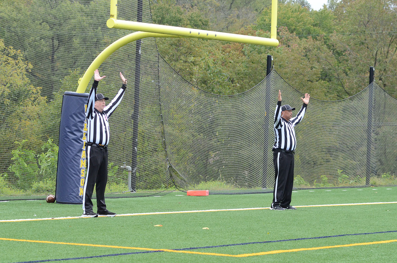 Football Upended in Defensive Battle