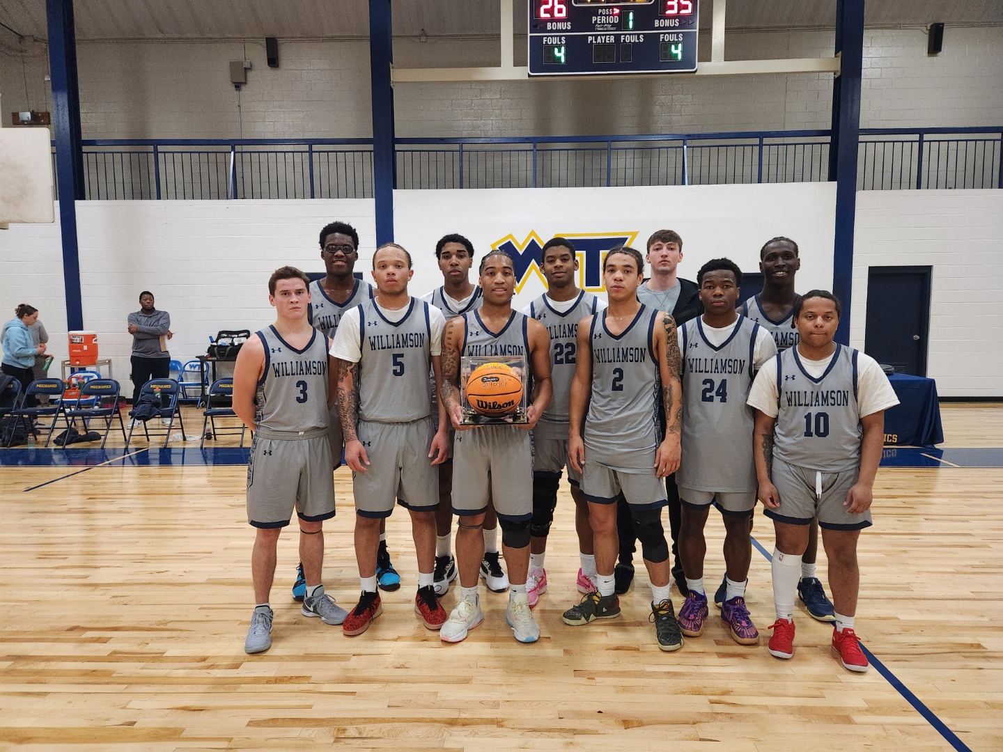 Senior Robert Wiley, show with his teammates, joined Williamson's 1,000 point club