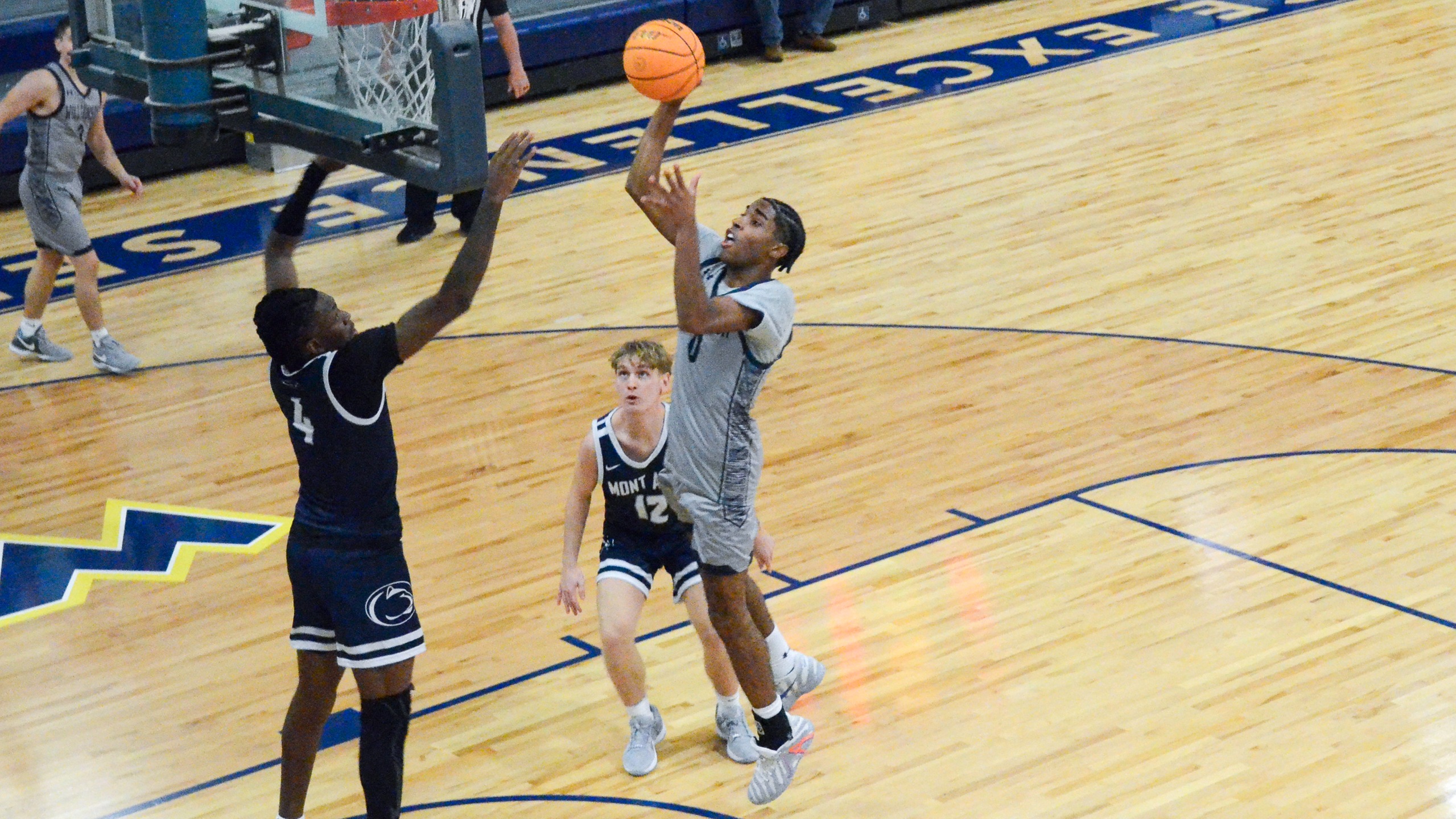 Basketball Downed by Manor on the Road